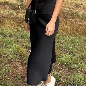 Black satin midi skirt